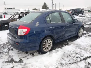 2009 Suzuki SX4 Sport FWD with VIN JS2YC414196202090, listed as a IAAI auction lot 41582385 with 160,838 mi miles and . Bid and sale history available at DreamBid. Image 4.