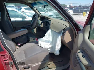 2001 Ford Explorer Sport Trac with VIN 1FMZU67E01UA93169, listed as a IAAI auction lot 42775405 with 105,897 mi miles and . Bid and sale history available at DreamBid. Image 5.