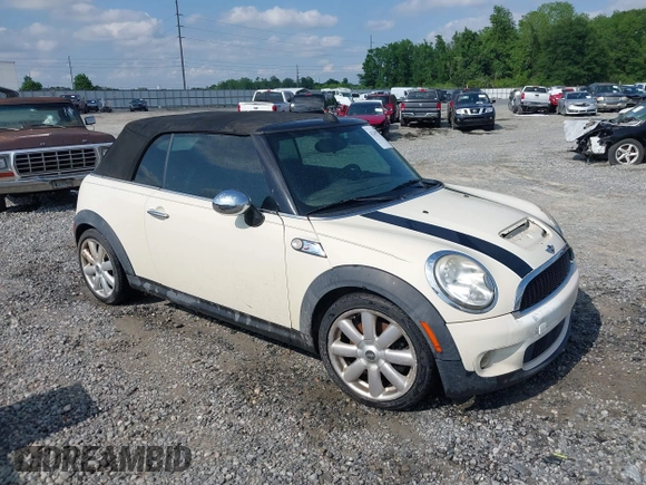 2010 MINI Convertible S with VIN WMWMS3C58ATY09098, listed as a IAAI auction lot 42149773 with 127,424 mi miles and . Bid and sale history available at DreamBid. Image 1.