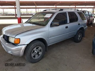 1999 Isuzu Rodeo S with VIN 4S2CM58W9X4354789, listed as a IAAI auction lot 42444956 with Not provided miles and . Bid and sale history available at DreamBid. Image 2.