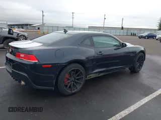 2014 Chevrolet Camaro LT z VIN 2G1FB1E3XE9265155, wystawiony jako IAAI lot #41227609 z przebiegiem 104 786 mil mil oraz . Historia ofert i sprzedaży dostępna na DreamBid. Obrazek 4.