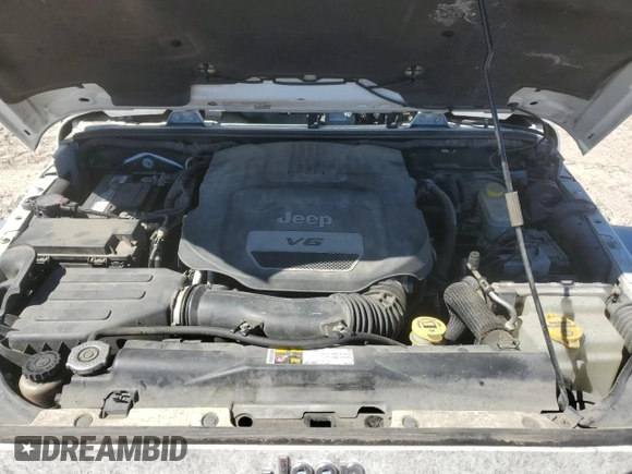 2014 Jeep Wrangler Sahara with VIN 1C4AJWBGXEL214269, listed as a Copart auction lot 47678045 with 283,634 mi miles and Clean Title. Bid and sale history available at DreamBid. Image 11.