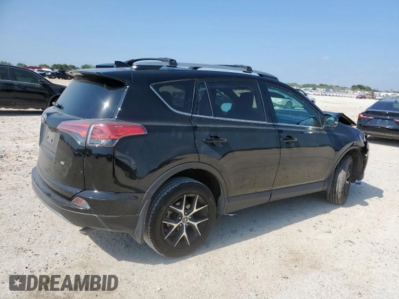 2018 Toyota RAV4 SE with VIN 2T3NFREV6JW436488, listed as a Copart auction lot 60297905 with 74,034 mi miles and Salvage title. Bid and sale history available at DreamBid. Image 3.