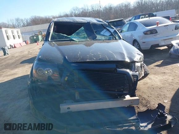 2011 Toyota Tacoma with VIN 3TMLU4EN4BM058738, listed as a IAAI auction lot 41646897 with 117,817 mi miles and . Bid and sale history available at DreamBid. Image 12.