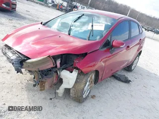 2015 Ford Fiesta SE z VIN 3FADP4BJ7FM223576, wystawiony jako IAAI lot #41505260 z przebiegiem 127 778 mil mil oraz . Historia ofert i sprzedaży dostępna na DreamBid. Obrazek 2.
