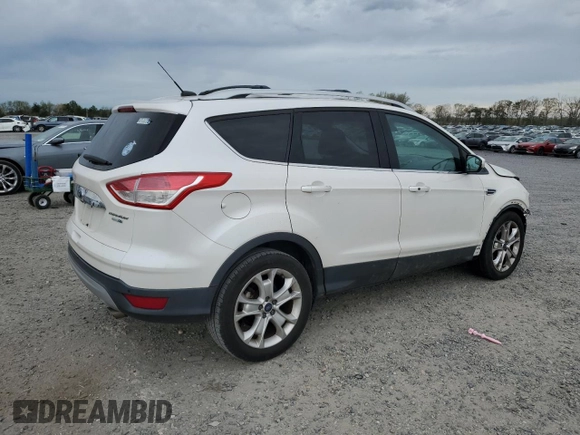 2016 Ford Escape Titanium with VIN 1FMCU9JX6GUB85980, listed as a Copart auction lot 51748715 with 129,537 mi miles and Salvage Title. Bid and sale history available at carsss.com. Image 3.