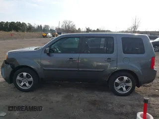 2012 Honda Pilot EX-L with VIN 5FNYF4H50CB074243, listed as a IAAI auction lot 41881319 with 167,727 mi miles and . Bid and sale history available at DreamBid. Image 14.