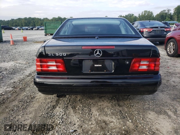 2000 Mercedes-Benz SL-Class with VIN WDBFA68F0YF190618, listed as a Copart auction lot 64791414 with 24,489 mi miles and Salvage Title. Bid and sale history available at carsss.com. Image 6.