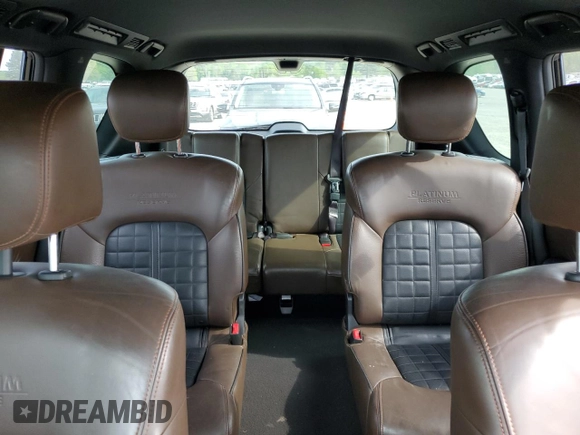 2018 Nissan Armada Platinum z VIN JN8AY2NF5J9332894, wystawiony jako Copart lot #52749905 z przebiegiem 128 352 mil mil oraz Szkoda całkowita • Salvage title. Historia ofert i sprzedaży dostępna na DreamBid. Obrazek 10.