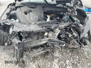 2018 Mazda CX-5 Grand Touring z VIN JM3KFBDM0J0403095, wystawiony jako Copart lot #48594495 z przebiegiem Nie podano mil oraz Szkoda całkowita • Salvage title. Historia ofert i sprzedaży dostępna na DreamBid. Obrazek 11.