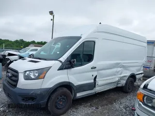 2020 Ford Transit Cargo z VIN 1FTBR3X87LKB51535, wystawiony jako IAAI lot #42382139 z przebiegiem 434 594 mil mil oraz . Historia ofert i sprzedaży dostępna na DreamBid. Obrazek 14.