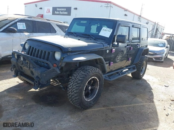 2013 Jeep Wrangler Unlimited Sport with VIN 1C4BJWDG9DL569109, listed as a IAAI auction lot 41207715 with 120,800 mi miles. Bid and sale history available at carsss.com. Image 2.