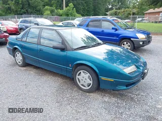 1993 Saturn SL with VIN 1G8ZK5575PZ199700, listed as a IAAI auction lot 42764082 with 152,058 mi miles and . Bid and sale history available at DreamBid. Image 1.