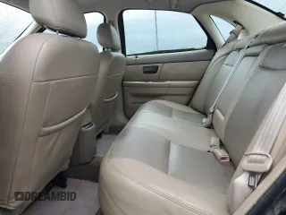 2003 Ford Taurus SEL Deluxe with VIN 1FAHP56S83A225002, listed as a Copart auction lot 49456975 with 199,759 mi miles and Salvage Title. Bid and sale history available at DreamBid. Image 10.