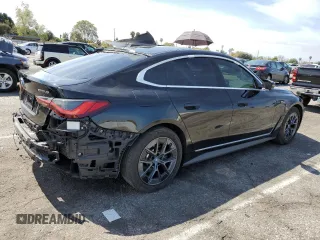 2023 BMW i4 eDrive40 with VIN WBY73AW04PFP08020, listed as a Copart auction lot 48641354 with 14,969 mi miles. Bid and sale history available at carsss.com. Image 3.