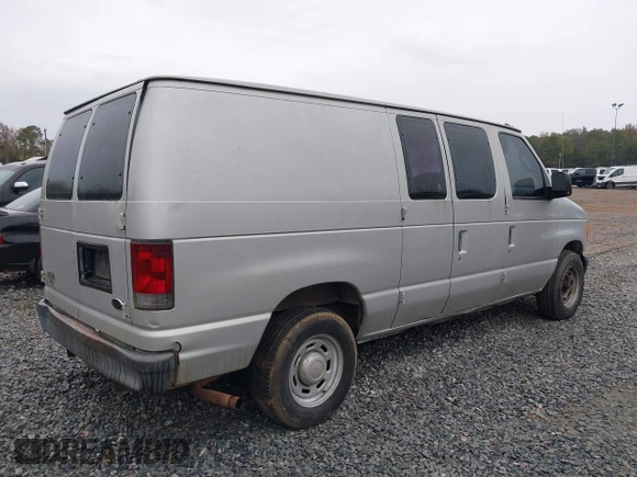 2005 Ford Econoline Cargo with VIN 1FTRE14W85HA67080, listed as a IAAI auction lot 40910996 with 599,247 mi miles. Bid and sale history available at carsss.com. Image 4.