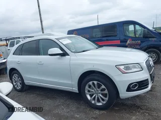 2015 Audi Q5 Premium Plus z VIN WA1LFAFP3FA051933, wystawiony jako IAAI lot #42346116 z przebiegiem 67 640 mil mil oraz . Historia ofert i sprzedaży dostępna na DreamBid. Obrazek 13.