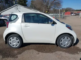 2012 Scion iQ with VIN JTNJJXB08CJ011734, listed as a IAAI auction lot 41769409 with 75,931 mi miles. Bid and sale history available at carsss.com. Image 13.