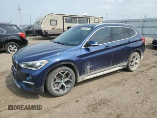 2016 BMW X1 xDrive28i z VIN WBXHT3C3XG5E54437, wystawiony jako Copart lot #60166455 z przebiegiem 127 007 mil mil oraz Szkoda całkowita • Salvage title. Historia ofert i sprzedaży dostępna na DreamBid. Obrazek 1.
