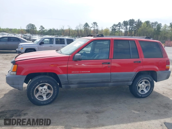 1996 Jeep Grand Cherokee Laredo with VIN 1J4FX58S4TC346218, listed as a IAAI auction lot 41943268 with 138,431 mi miles and . Bid and sale history available at DreamBid. Image 14.