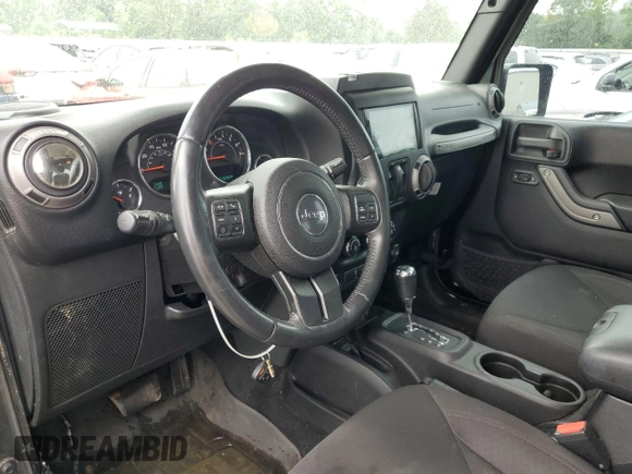 2016 Jeep Wrangler Sport с VIN 1C4GJWAG4GL139826, выставлен на аукционе Copart как лот 56746735 с пробегом 153 297 миль миль и Списание • Salvage title. История ставок и продаж доступна на DreamBid. Изображение 8.