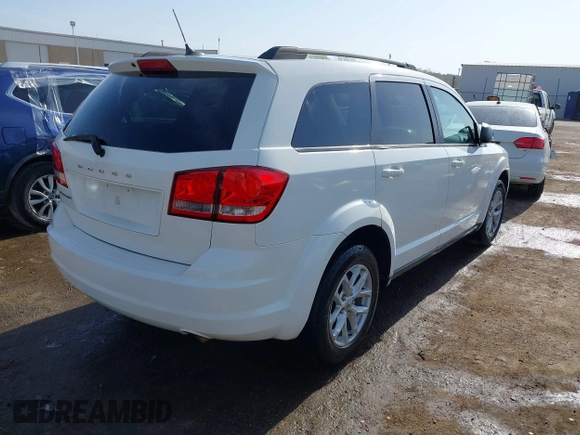 2014 Dodge Journey SE with VIN 3C4PDCAB0ET293641, listed as a IAAI auction lot 42001844 with 138,740 mi miles. Bid and sale history available at carsss.com. Image 4.