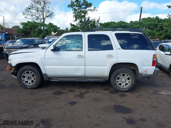2003 Chevrolet Tahoe Z71 with VIN 1GNEK13T53R109296, listed as a IAAI auction lot 41659341 with 223,479 mi miles. Bid and sale history available at carsss.com. Image 14.