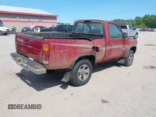 1997 Nissan Frontier XE z VIN 1N6SD11Y4VC415557, wystawiony jako IAAI lot #42399415 z przebiegiem 131 363 mil mil oraz . Historia ofert i sprzedaży dostępna na DreamBid. Obrazek 4.