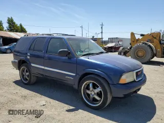 2001 GMC Jimmy SLE Rental Fleet z VIN 1GKDT13W212108144, wystawiony jako Copart lot #58753865 z przebiegiem 254 402 mil mil oraz Szkoda całkowita • Salvage title. Historia ofert i sprzedaży dostępna na DreamBid. Obrazek 4.