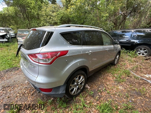2016 Ford Escape Titanium with VIN 1FMCU9JXXGUC33190, listed as a Copart auction lot 51374865 with 222,129 mi miles and Clean Title. Bid and sale history available at carsss.com. Image 4.