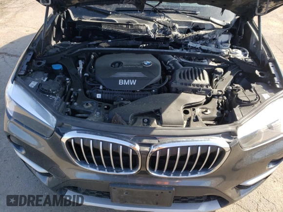 2018 BMW X1 xDrive28i with VIN WBXHT3C33J5K31838, listed as a Copart auction lot 48650943 with 63,064 mi miles and . Bid and sale history available at DreamBid. Image 12.