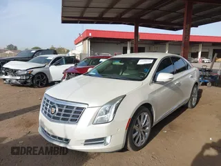 2014 Cadillac XTS Luxury with VIN 2G61M5S35E9199253, listed as a IAAI auction lot 41400558 with 112,955 mi miles. Bid and sale history available at carsss.com. Image 2.