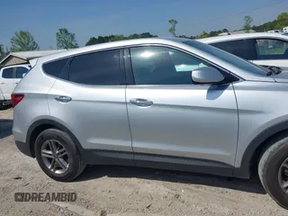 2018 Hyundai Santa Fe 2.4L z VIN 5XYZTDLB9JG513584, wystawiony jako IAAI lot #42031291 z przebiegiem 131 109 mil mil oraz . Historia ofert i sprzedaży dostępna na DreamBid. Obrazek 13.