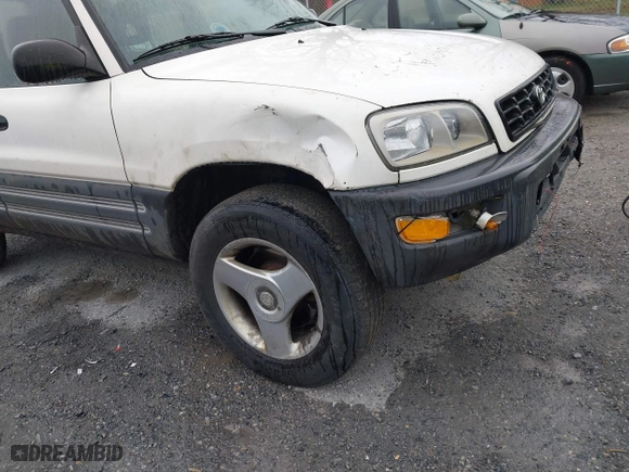 1999 Toyota RAV4 with VIN JT3HP10VXX7115145, listed as a IAAI auction lot 41853011 with 211,121 mi miles. Bid and sale history available at carsss.com. Image 6.