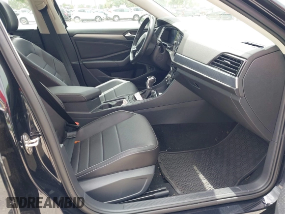 2023 Volkswagen Jetta SE with VIN 3VW7M7BU3PM037141, listed as a IAAI auction lot 42446046 with 21,149 mi miles and . Bid and sale history available at DreamBid. Image 5.