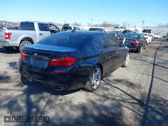 2013 BMW 5 Series 550i xDrive with VIN WBAFU9C52DDY70807, listed as a IAAI auction lot 41902163 with 92,021 mi miles and . Bid and sale history available at carsss.com. Image 4.