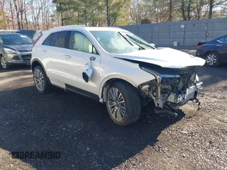 2024 Cadillac XT4 AWD Premium Luxury with VIN 1GYFZDR41RF206526, listed as a IAAI auction lot 41663532 with 5,070 mi miles and . Bid and sale history available at carsss.com. Image 1.