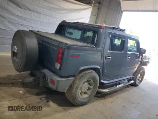 2006 Hummer H2 z VIN 5GRGN22U46H109632, wystawiony jako Copart lot #58478605 z przebiegiem 180 047 mil mil oraz Szkody całkowita. Historia ofert i sprzedaży dostępna na DreamBid. Obrazek 3.