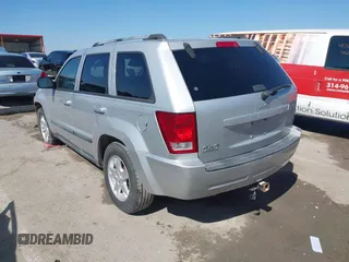 2007 Jeep Grand Cherokee Laredo z VIN 1J8GR48K67C543257, wystawiony jako IAAI lot #41733644 z przebiegiem 201 936 mil mil oraz . Historia ofert i sprzedaży dostępna na DreamBid. Obrazek 3.