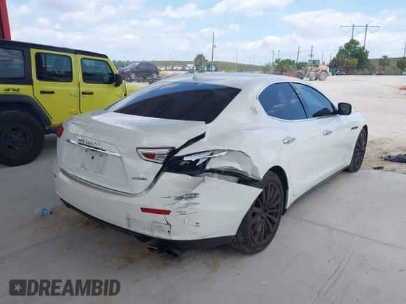 2016 Maserati Ghibli S with VIN ZAM57RSA3G1171238, listed as a IAAI auction lot 42290180 with 117,738 mi miles and . Bid and sale history available at DreamBid. Image 6.