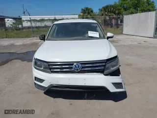 2021 Volkswagen Tiguan SE with VIN 3VV2B7AX4MM031490, listed as a IAAI auction lot 41829654 with 55,739 mi miles. Bid and sale history available at carsss.com. Image 11.