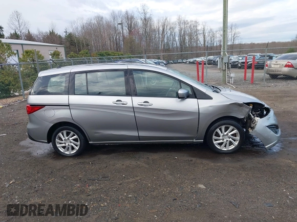2012 Mazda 5 Sport with VIN JM1CW2BLXC0107933, listed as a IAAI auction lot 41813231 with 164,395 mi miles and . Bid and sale history available at DreamBid. Image 14.