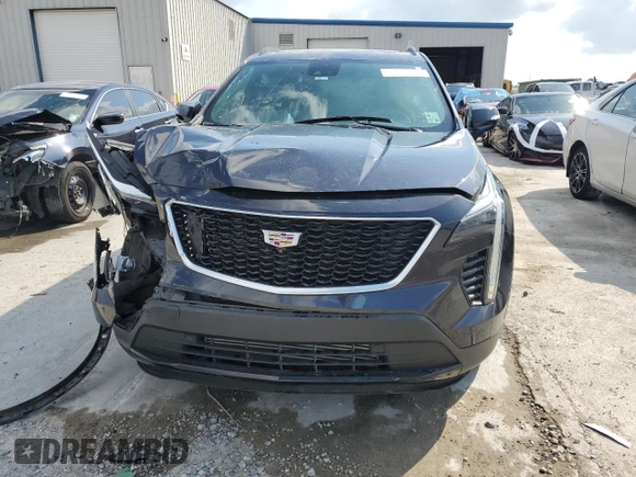 2022 Cadillac XT4 FWD Sport with VIN 1GYFZER46NF119009, listed as a Copart auction lot 57651725 with 37,896 mi miles and Salvage title. Bid and sale history available at DreamBid. Image 5.