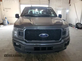 2020 Ford F-150 XL with VIN 1FTEW1E44LFC02735, listed as a Copart auction lot 62062125 with 111,471 mi miles and Salvage title. Bid and sale history available at DreamBid. Image 5.
