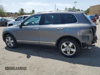 2012 Volkswagen Touareg Sport with VIN WVGEF9BP0CD010197, listed as a Copart auction lot 48480355 with 131,605 mi miles and Salvage Title. Bid and sale history available at DreamBid. Image 2.