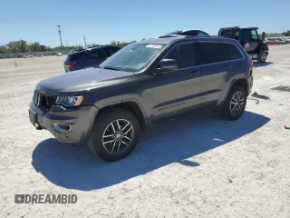 2018 Jeep Grand Cherokee Laredo E with VIN 1C4RJFAG9JC444089, listed as a Copart auction lot 49710925 with 127,707 mi miles and Salvage Title. Bid and sale history available at carsss.com. Image 1.