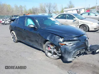 2019 Alfa Romeo Giulia Ti z VIN ZARFANBN8K7603243, wystawiony jako IAAI lot #42092201 z przebiegiem 47 559 mil mil oraz . Historia ofert i sprzedaży dostępna na DreamBid. Obrazek 1.