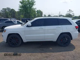 2020 Jeep Grand Cherokee Laredo E with VIN 1C4RJFAG5LC375033, listed as a IAAI auction lot 42415231 with 62,489 mi miles and . Bid and sale history available at DreamBid. Image 14.
