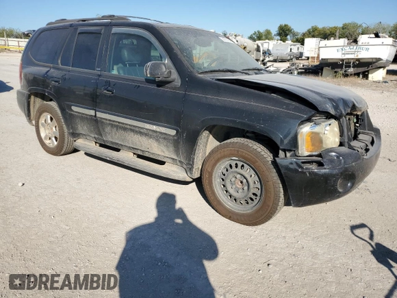 2002 GMC Envoy SLE with VIN 1GKDS13S022512481, listed as a Copart auction lot 74701454 with 0 mi miles and Salvage Title. Bid and sale history available at carsss.com. Image 4.