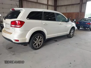 2013 Dodge Journey R/T with VIN 3C4PDDEG3DT591806, listed as a IAAI auction lot 42678661 with 127,613 mi miles and . Bid and sale history available at DreamBid. Image 4.